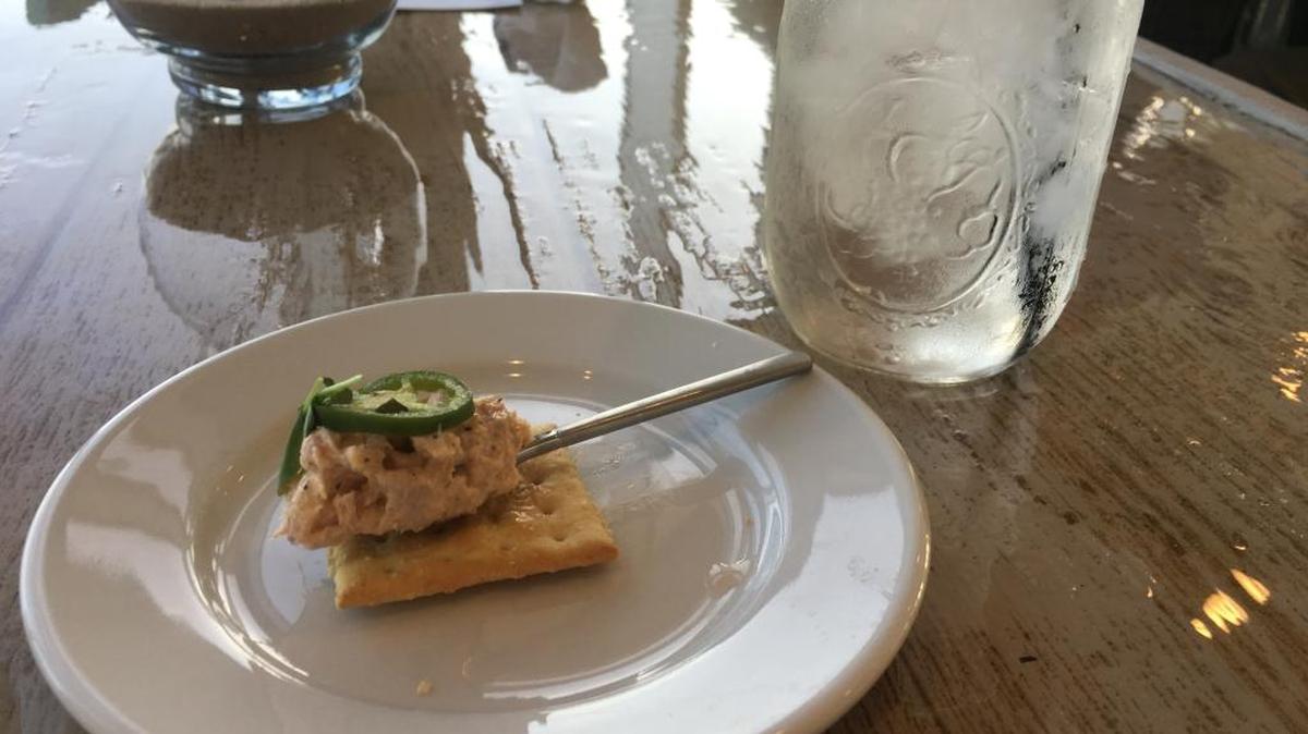 A dollop of House Smoked Tuna Dip is served to each customer at Brackish Seafood Restaurant in Long Beach.