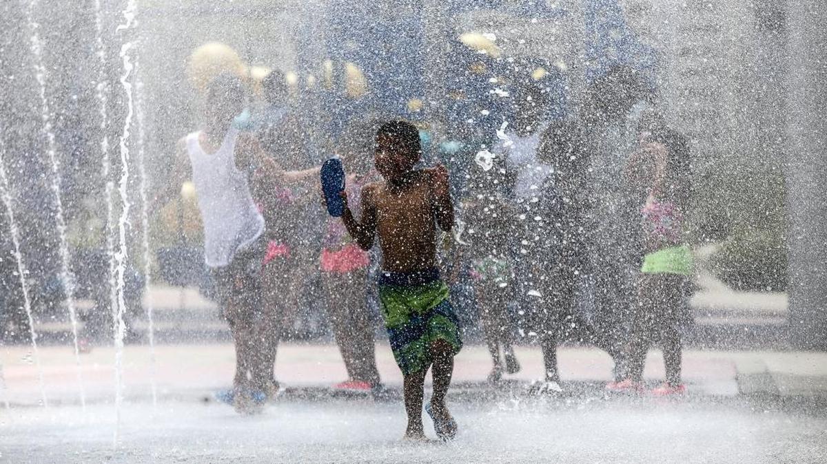 Kids cool off in the splash pad at Point Cadet Plaza in Biloxi in this Sun Herald file photo. Field trips to local attractions are part of the Biloxi Summer Camp. The city sparked a debate on wages when posting a help wanted on social media this week.