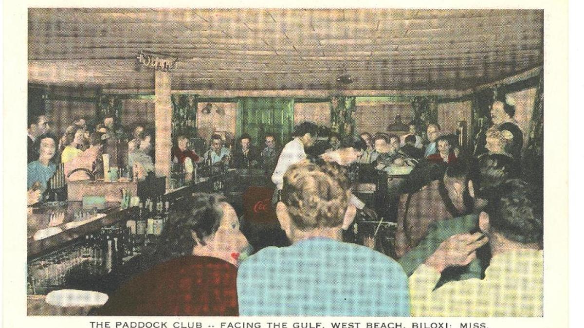 Customers at the Biloxi Paddock Club enjoy live entertainment. Postcard