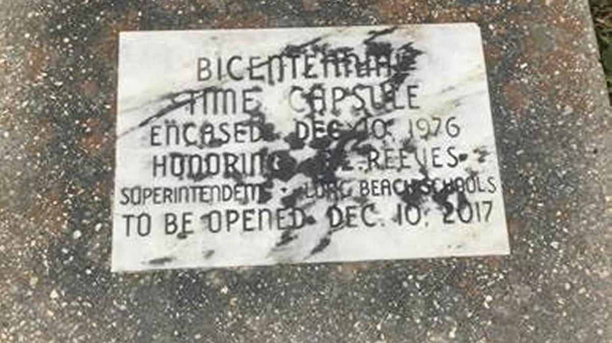 A time capsule buried beneath this marble marker will be opened Dec. 10 at Long Beach Middle School. The marker states ‘Bicentennial time capsule; encased Dec. 10, 1976; honoring T.L. Reeves; superintendent, Long Beach Schools; to be opened Dec. 10, 2017.’