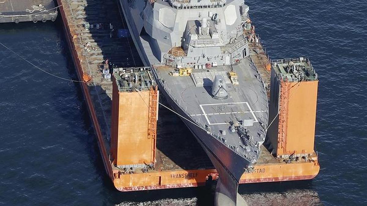 The USS Fitzgerald is seen on a U.S. lift transport vessel off Yokosuka,Japan, on Saturday.