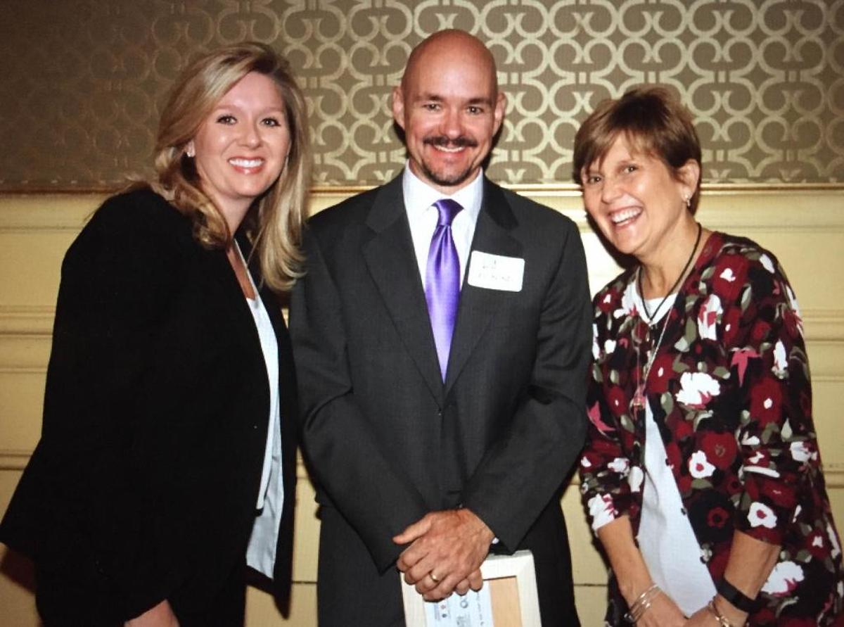 Julie Gresham of the Gulf Coast chamber, Lee Bond of the Jackson County chamber and Cathy Wilson of the Hancock Chamber presented the One Coast awards in 2016 at Beau Rivage Resort & Casino.