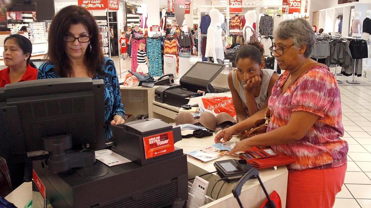 Shoppers buy clothes at JC Penney at Edgewater Mall in Biloxi during the 2015 tax-free holiday. This year’s tax-free shopping days are July 29-30.