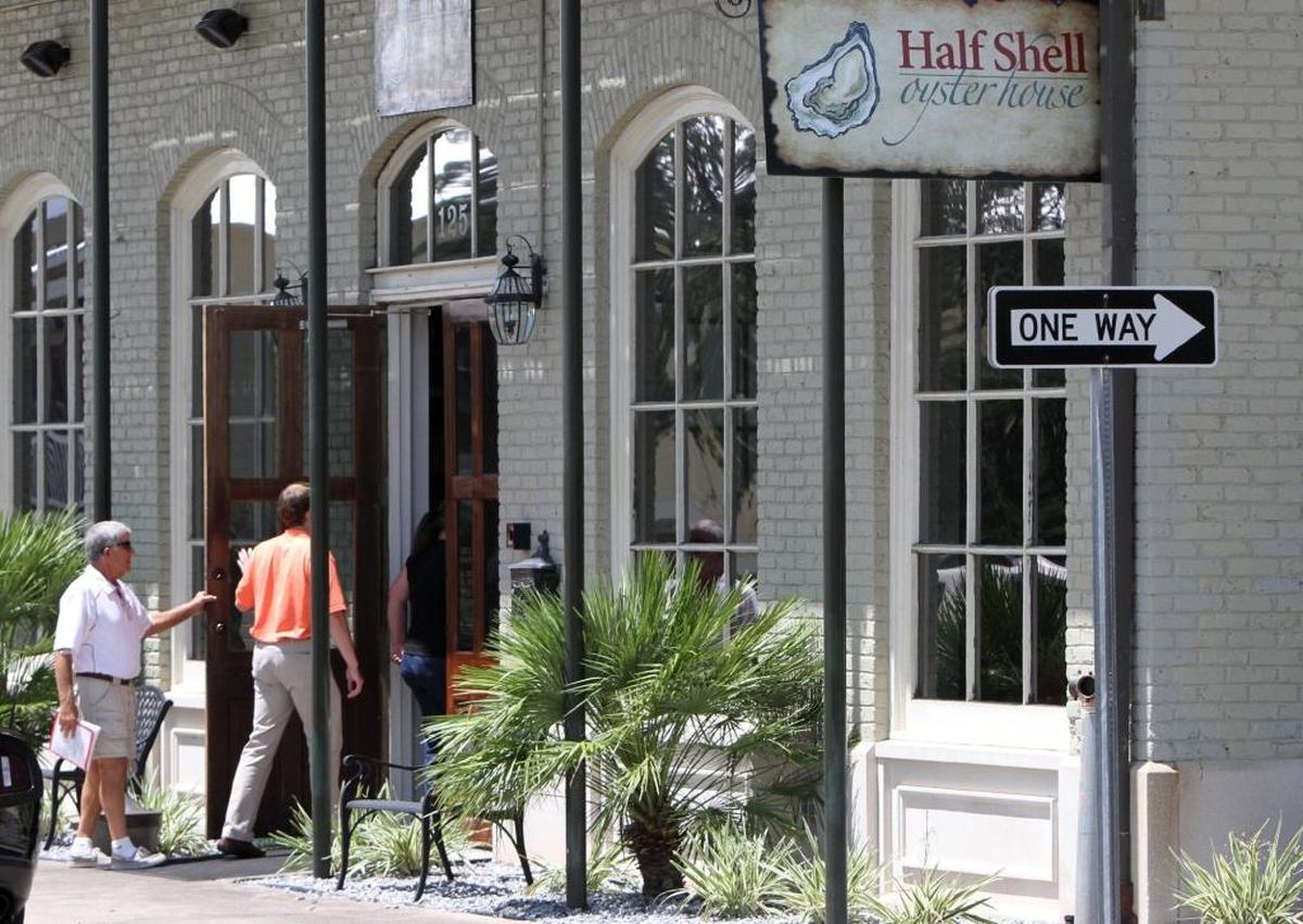 Customers walk into Half Shell Oyster House restaurant on Lameuse Street in Biloxi.