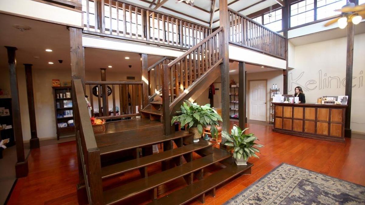 The entrance to Kelinci Spa and Bed & Breakfast has a reception desk, dining area and a room upstairs for yoga classes.