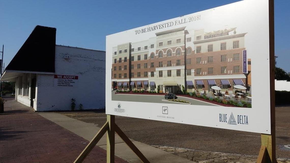 A sign in downtown Cleveland, Miss., shows another hotel development in the area where the Trump family plans to open properties. The hope of the buildup is to lure tourists to the area in search of blues music.