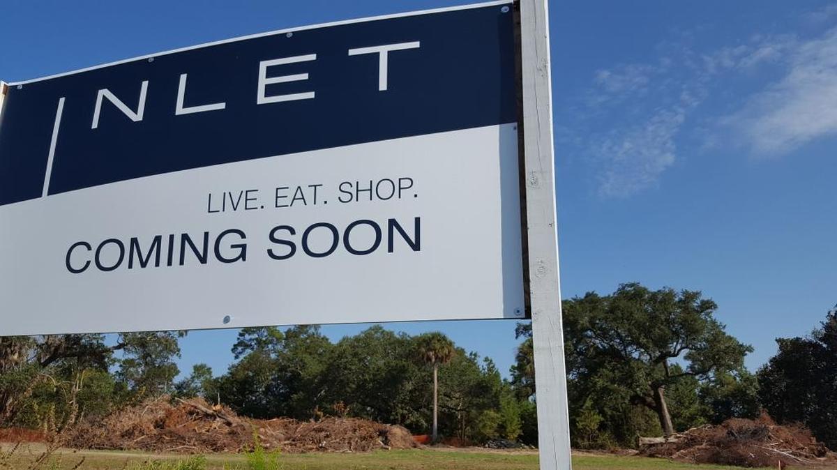 Contractors are clearing the site for Inlet, the new $10 million development along U.S. 90 in Ocean Springs. City officials estimate another 16 months until they have a building complete.