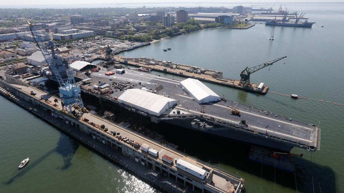 In this April 27, 2016 photo, USS Gerald R. Ford is stationed at Newport News Shipbuilding in Newport News, Va. President Donald Trump will visit Newport News Shipbuilding on Thursday, fresh off a speech to Congress where he plans to propose a hefty increase in defense spending.