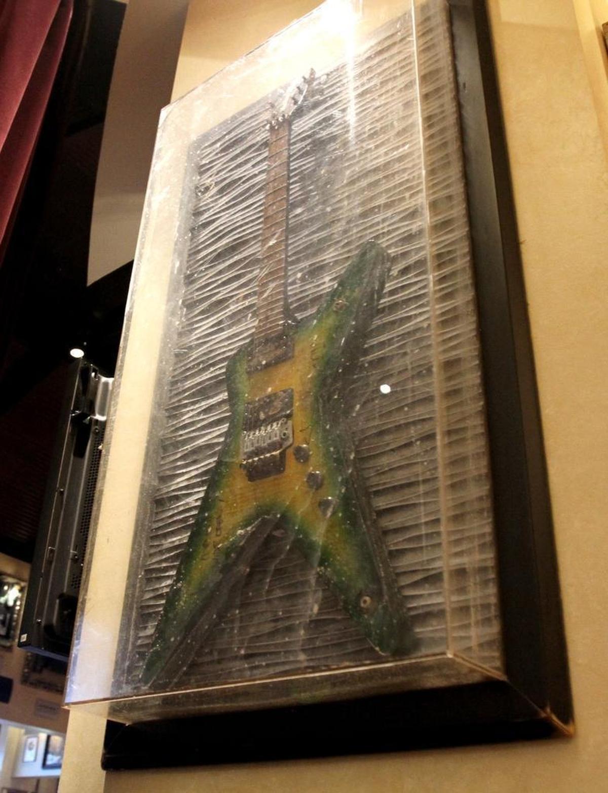 A guitar owned by Dimebag Darrell of Pantera was recovered after Hurricane Katrina and was hung “as is” at Hard Rock Kasino Biloxi to show the scars from the storm.
