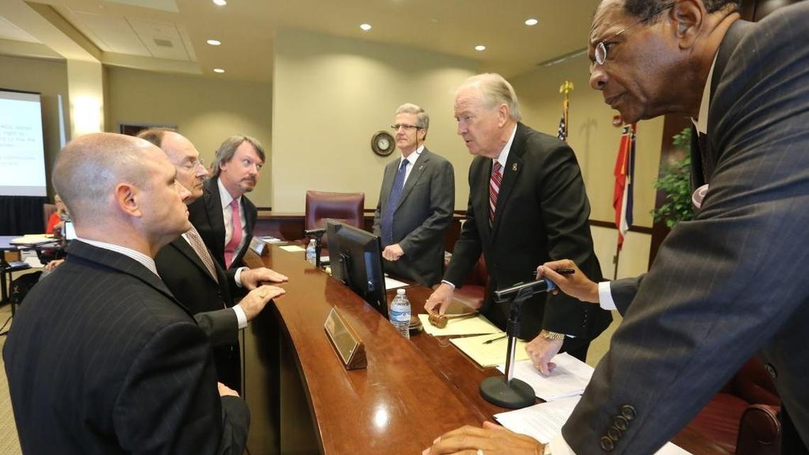 Attorneys from Balch & Bingham talk to Mississippi Gaming Commissioners during a recess of a hearing on Thursday, Feb. 16, 2017 to determine if property in Biloxi and Diamondhead are suitable gaming sites. The Gaming Commission turned down both sites and both developers have appealed the decisions.