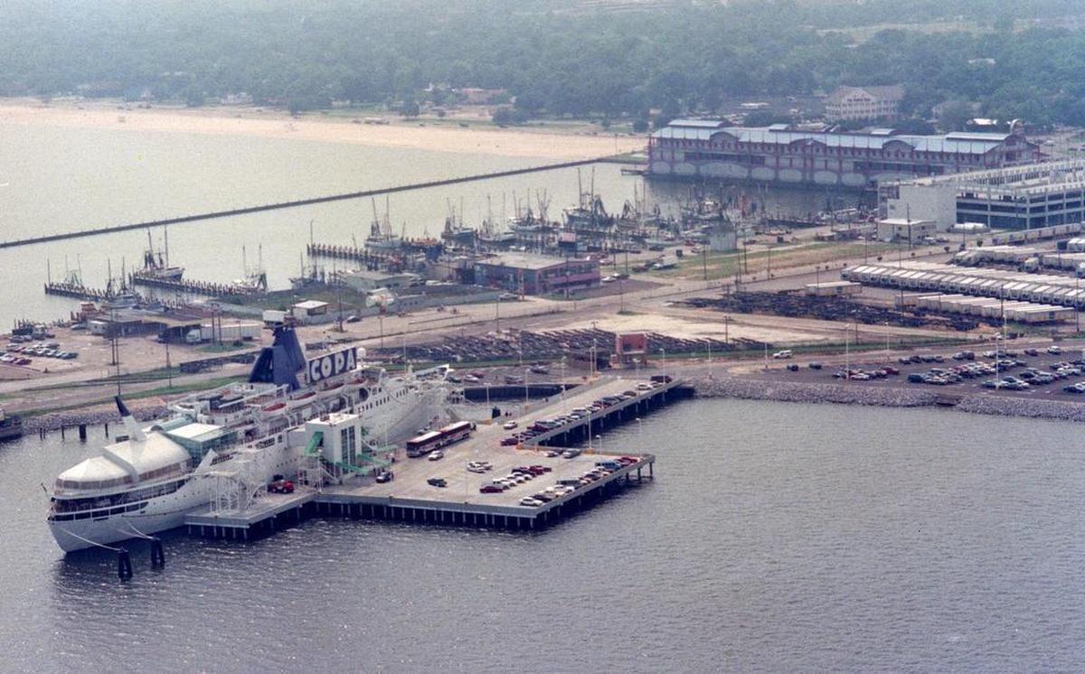 Past: This 1994 photo shows The Copa Casino, left, a cruise ship permanently docked at the state port in Gulfport. It eventually was replaced with a casino barge that was displaced by Hurricane Katrina. At top is the Grand Gulfport, that later became the Island View Casino.