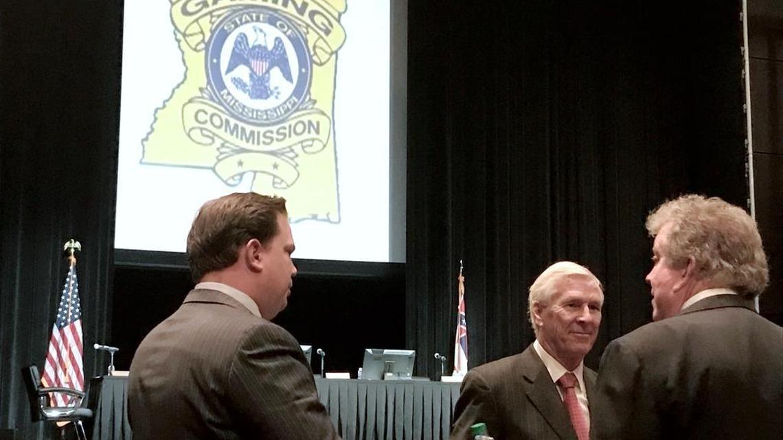 Attorney Michael Cavanaugh, center, talks to Ray Wooldridge, right, and Brandon Wooldridge of RW Development before the Mississippi Gaming Commission meeting Thursday, March 16, 2017, at Hard Rock Biloxi. RW Development has been denied site approval three times but now is partnering with the City of Biloxi to lease waterfront that could make the company’s land a legal casino site.