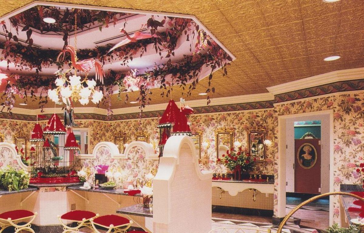 This Grand Casino Biloxi postcard shows the extravagant bathrooms with 37 stalls that cost $500,000 more than a standard restroom.