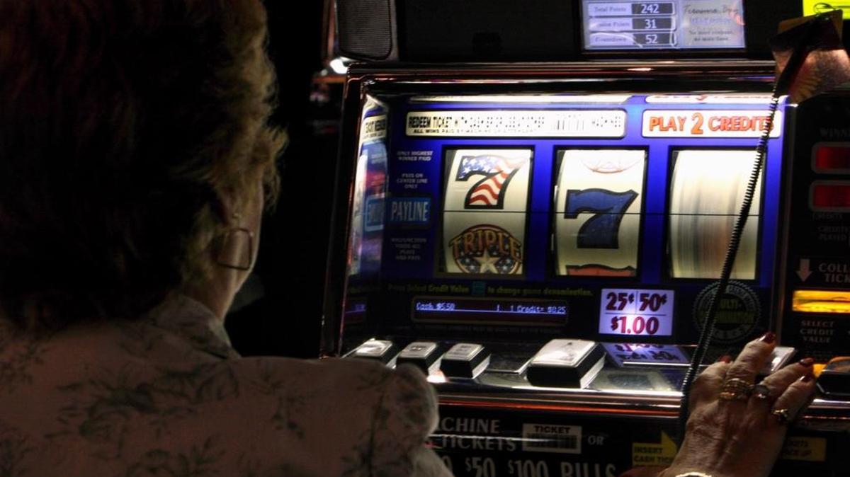 A woman plays the slots at Treasure Bay Casino in Biloxi. The 12 percent tax on casino revenue in Mississippi is divided between the state, which collects 8 percent and puts most of that into the general fund, and up to 4 percent for the city or county in which the casino is located.