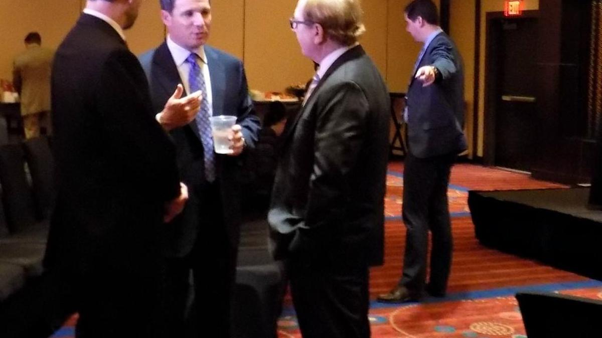 Geoff Freeman, center, president of the American Gaming Association, said at IP Casino Resort in Biloxi on Aug. 3 that sports betting could help Mississippi and other states. At left is Allen Godfrey, executive director of the Mississippi Gaming Commission, and at right is Larry Gregory, director of the Mississippi Gaming and Hospitality Association.