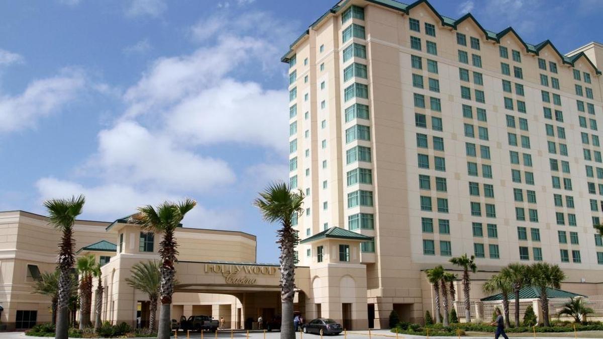 Hollywood Casino Gulf Coast faces a lawsuit from a Hollywood Hotel guest who says she suffered multiple cuts from an exploding shower door.
