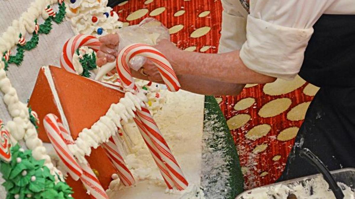 Chefs at Scarlet Pearl Casino Resort in D’Iberville work on a gingerbread village.