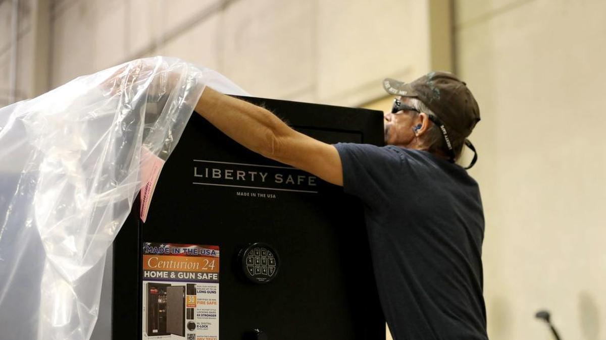 A worker packages a safe at the Liberty Safe & Security Products Inc. manufacturing facility in Payson, Utah, on Aug. 29.