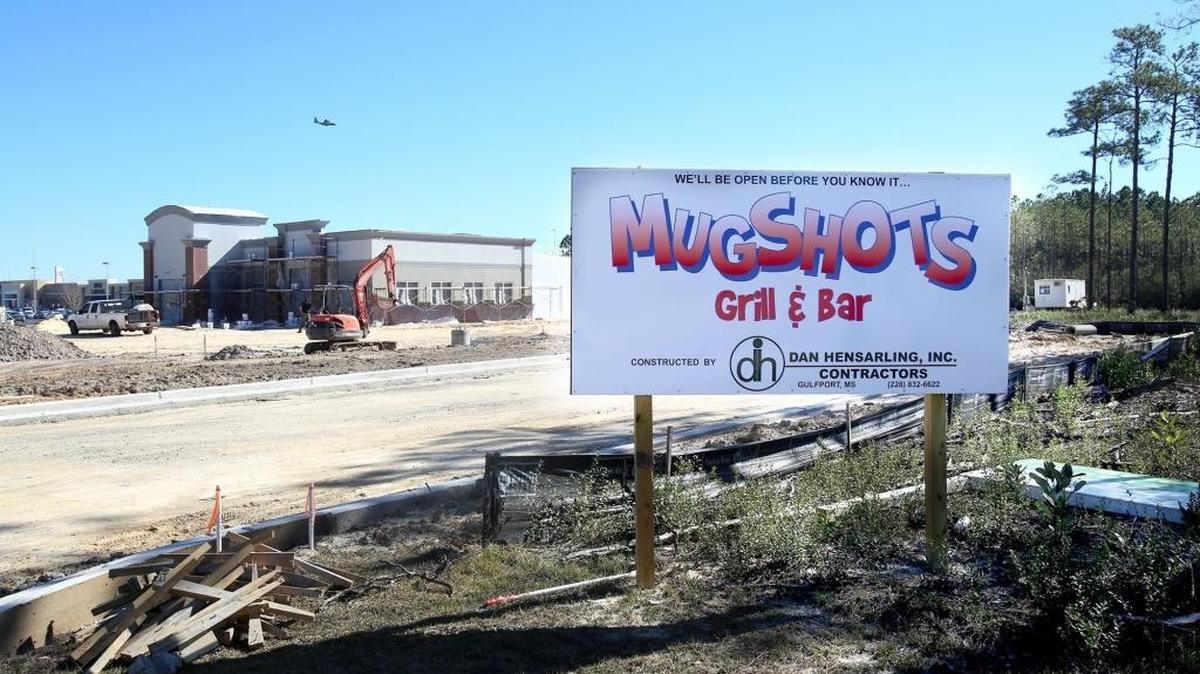 At the west end of The Promenade in D'Iberville, Southeast Commercial is starting to develop the 22 acres north and south of Promenade Parkway. Mugshots is the first building up on the south side. The developers are asking the city and county to back a $5 million TIF bond for infrastructure.