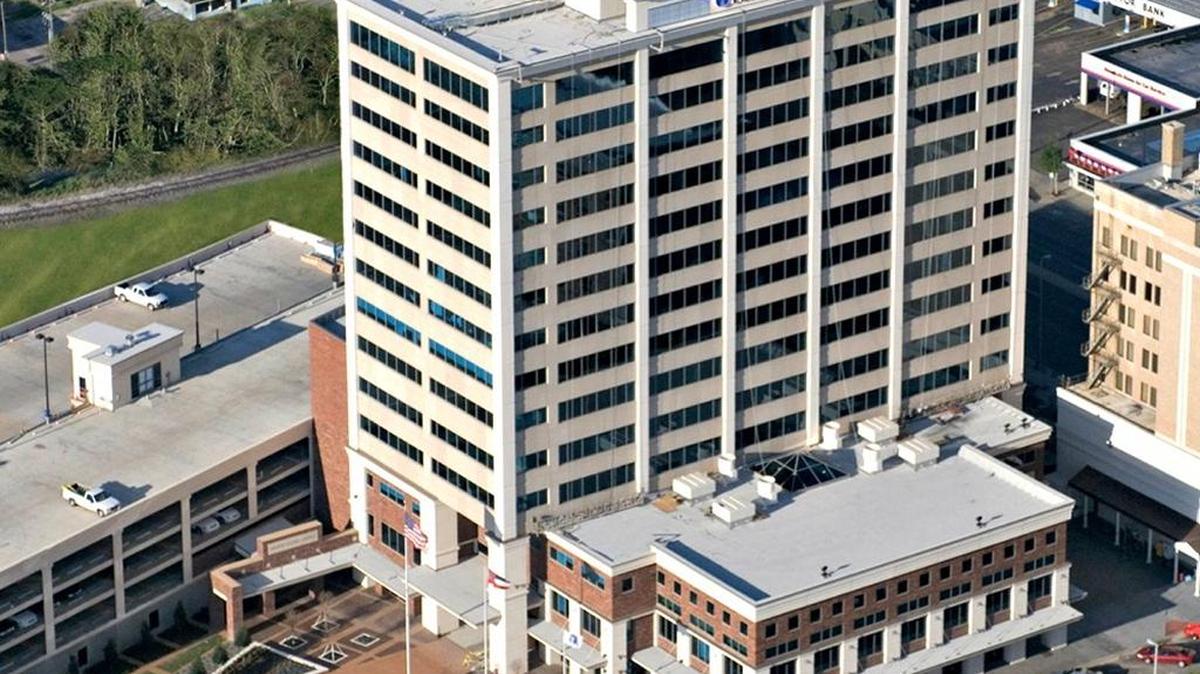 Shown is a file photo of Hancock Bank in downtown Gulfport. Hancock Holding Company announced Monday a purchase agreement to acquire investment management and trust business from Capital One.