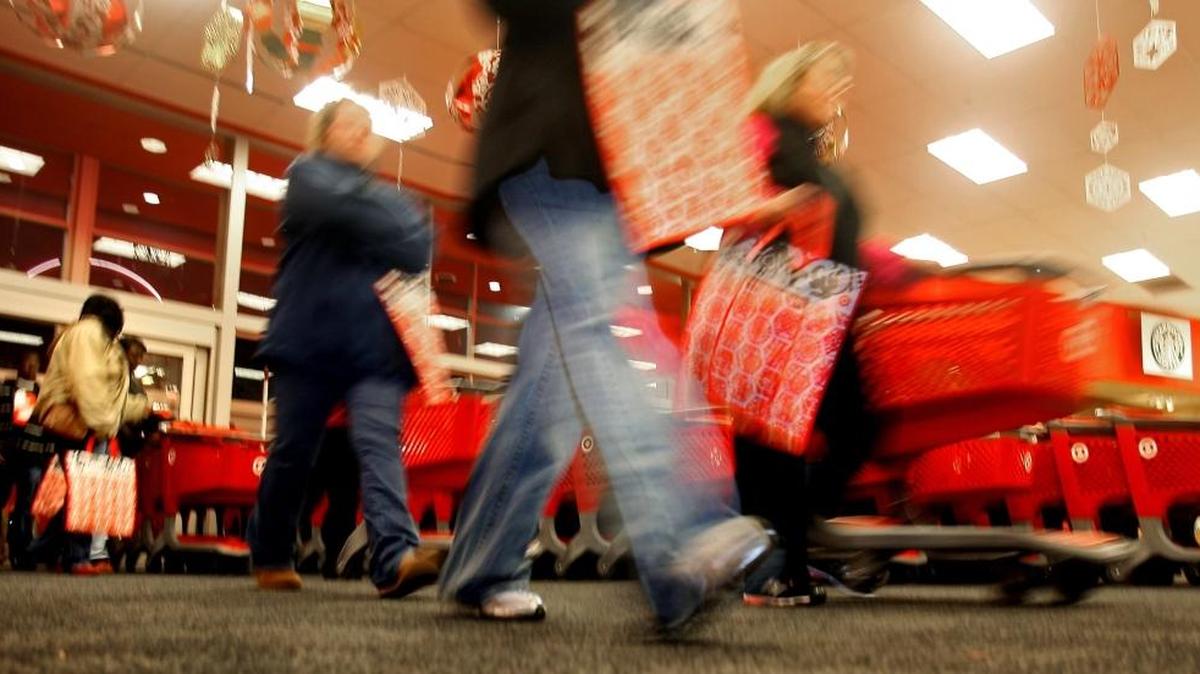 Shoppers rush into Target to get the best deals during the start of Black Friday shopping in 2009.