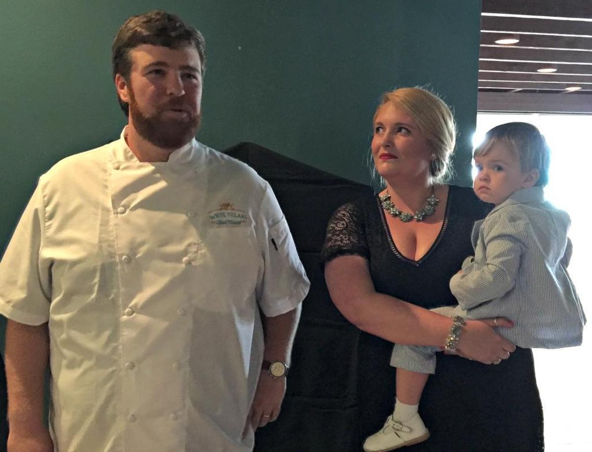 Chef Austin Sumrall and Tresse Sumrall and their son, Ollie, celebrate a new beginning Monday as they prepare to reopen White Pillars restaurant, which once was the place to celebrate special occasions in Biloxi. It has been closed for 30 years.