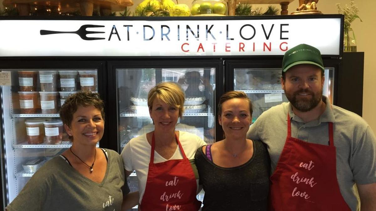 Tori Davidson, left, stands with co-worker Angie Hooker and co-owners Lauren Braden and Seth Braden at Eat.Drink.Love catering in Ocean Springs.