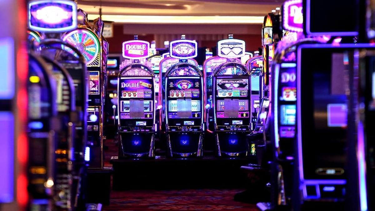 Slot machines stand ready at the Scarlet Pearl Casino Resort in D’Iberville before the casino opened in December. Coast casino revenue was up just under 1 percent in July compared with a year ago, but year to date is $28 million ahead of last year’s pace.