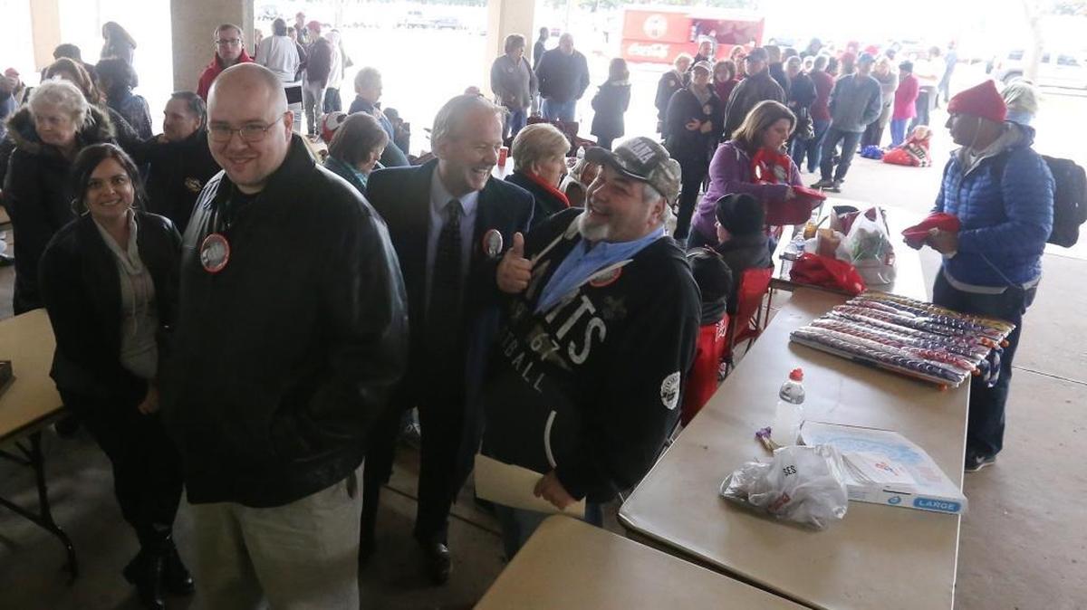 Early arrivals at the Donald Trump rally on Saturday Jan. 2, 2015 wait for the doors to open. By the end of the year, metal detectors should be in place for all public concerts and events to enhance security.