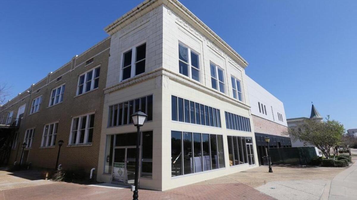 Kress Live building on Howard Avenue in Vieux Marche in Biloxi on Thursday, Feb. 23, 2017. The restored building in now bank owned and the price has dropped to $1.8 million.