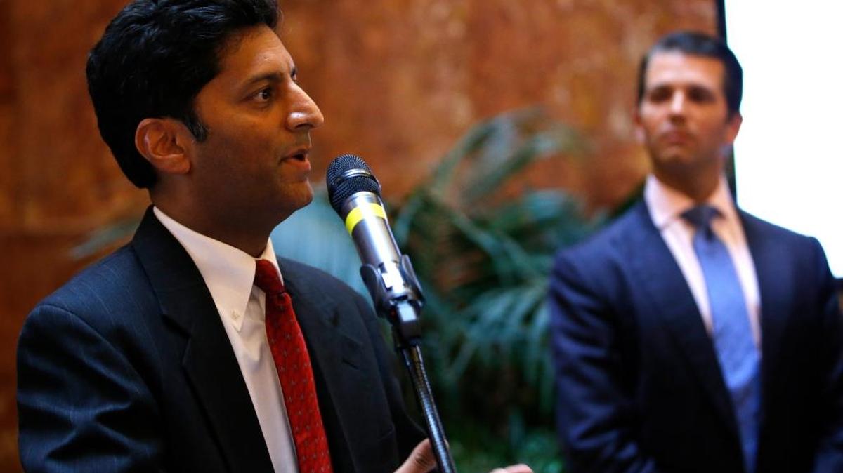 Donald Trump Jr., right, listens as Suresh Chawla speaks to a group of invitees inside Trump Tower on June 5, 2017, in New York, where Trump Jr. announced that Suresh and his brother Dinesh Chawla, CEO of Chawla Hotels, will turn over management of several of their Mississippi hotels to The Trump Organization, who will get management and franchise fees for the new ventures.