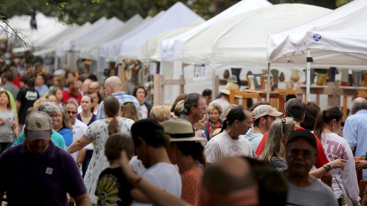 Crowds of people fill the streets of downtown Ocean Springs for the 37th annual Peter Anderson Arts and Crafts Festival on Nov. 7, 2015. The festival has made the Southeast Tourism Society’s list of Top 20 events.
