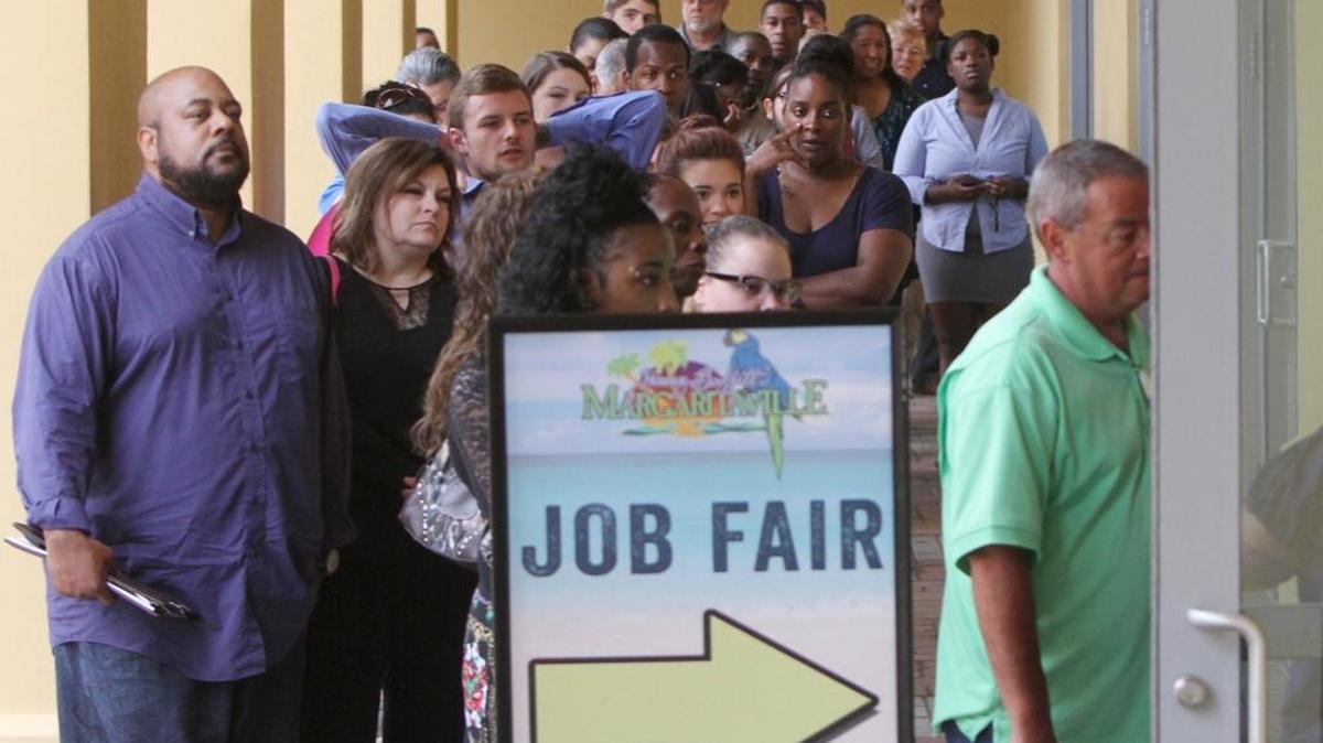 Job applicants stand in line outside the Biloxi Civic Center for job fair in 2016. The Governor’s Job Fair Network is bringing more than 30 companies looking for employees to an event in Gulfport this month.
