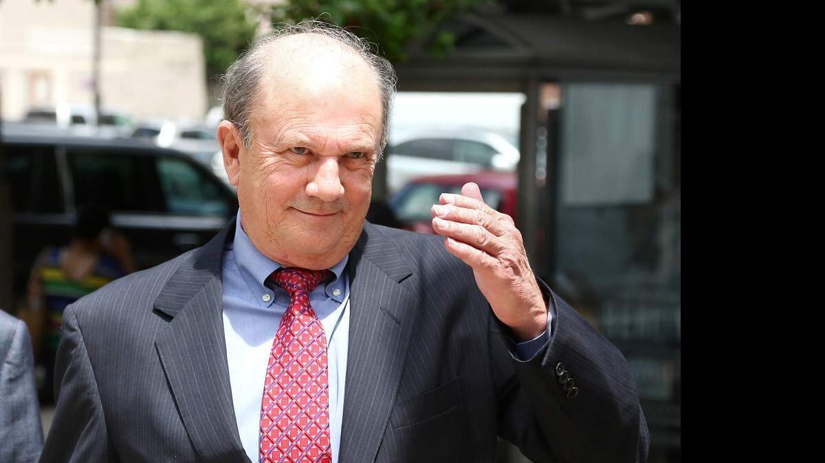 ELIOT KAMENITZ/THE ADVOCATE
Former St. Tammany Parish District Attorney Walter Reed enters the Federal Court House to face indictments in New Orleans, La. Monday, May 4, 2015
