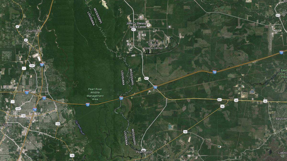 Westbound lanes of Interstate 10 near the Mississippi-Louisiana state line were closed Wednesday afternoon after an 18-wheeler overturned and leaked corrosive material onto the roadway.