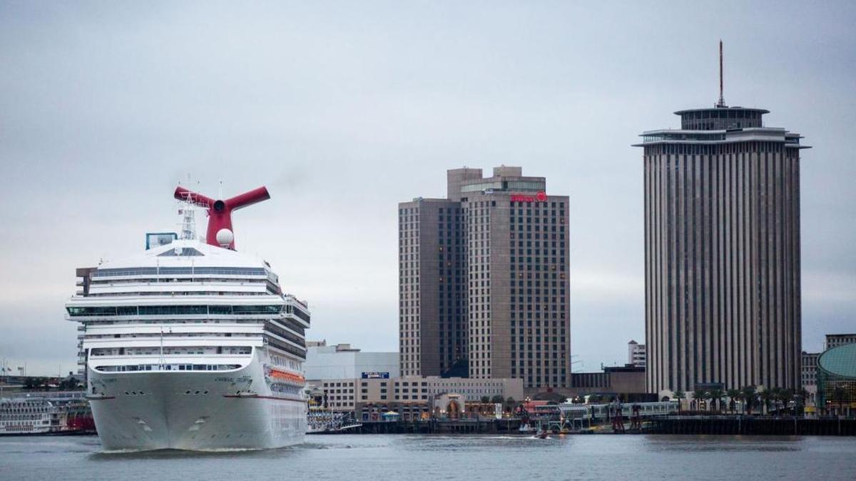 The Carnival Triumph cruise ship takes off down the Mississippi River from the Port of New Orleans on December 5, 2016. A passenger on the Triumph was 'seen going overboard' on Sunday night, according to a spokesman for Carnival.