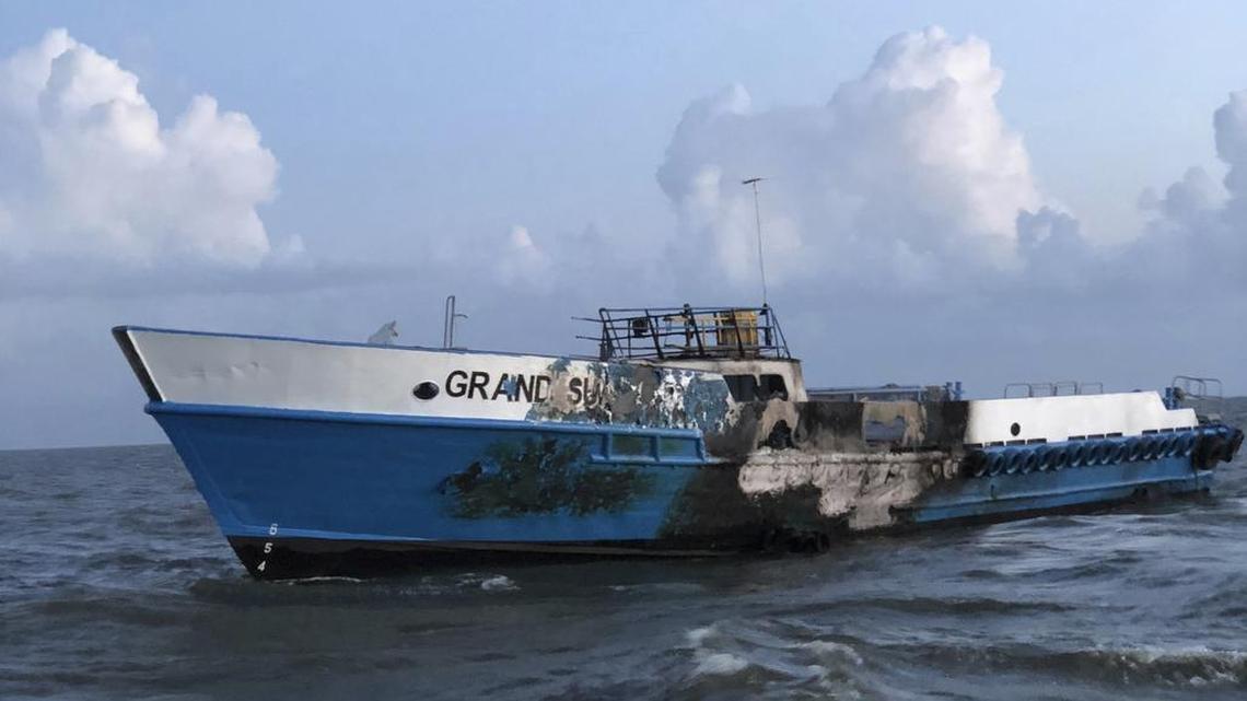 A 45-foot Response Boat-Medium crew from Coast Guard Station Venice, Louisiana, monitors the location of a passenger vessel that caught fire in Chandeleur Sound, Louisiana, Monday, Oct. 8, 2018. A Coast Guard MH-65 Dolphin helicopter crew from Coast Guard Air Station New Orleans rescued four people from the vessel.