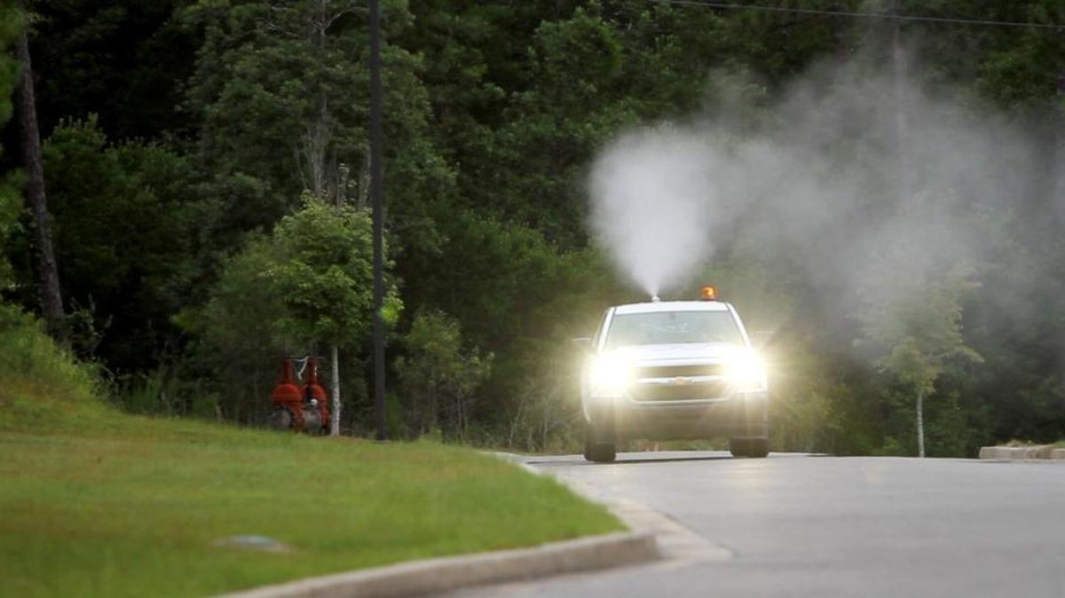 Jesse Drake Jr., sprays in the Popp’s Ferry and Cedar Lake area in an effort to control the mosquito population on the Mississippi Gulf Coast.