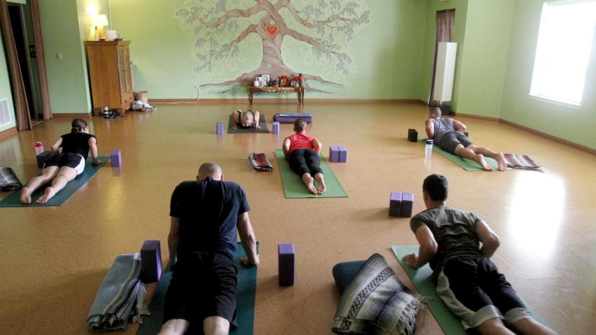 Mary Ann O'Gorman conducts a yoga class for Connected Warriors at River Rock Yoga. Yoga will be a focus at the Stress Free Mind — Heart Happy forum from 6 to 7 p.m. Thursday at the Biloxi Visitors Center.