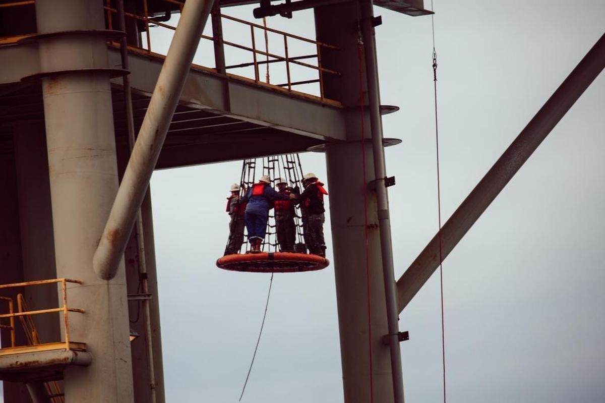 Workers board an oil and gas platform run by Energy XXI in the Gulf of Mexico, south of Port Fourchon, La., Jan. 10, 2018. Energy XXI, which has been cited for workplace safety violations at a rate much higher than the industry average, is among the companies benefitting from the Trump administration’s efforts to upend financial, environmental and safety regulations.