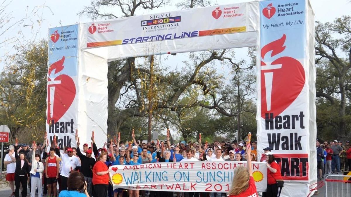 Participants celebrate a previous Heart Walk event in Jackson County. The Jackson County Healthy For Good Heart Walk, an event to benefit the American Heart Association, begins at 7:30 a.m. Saturday at Beach Park in Pascagoula.