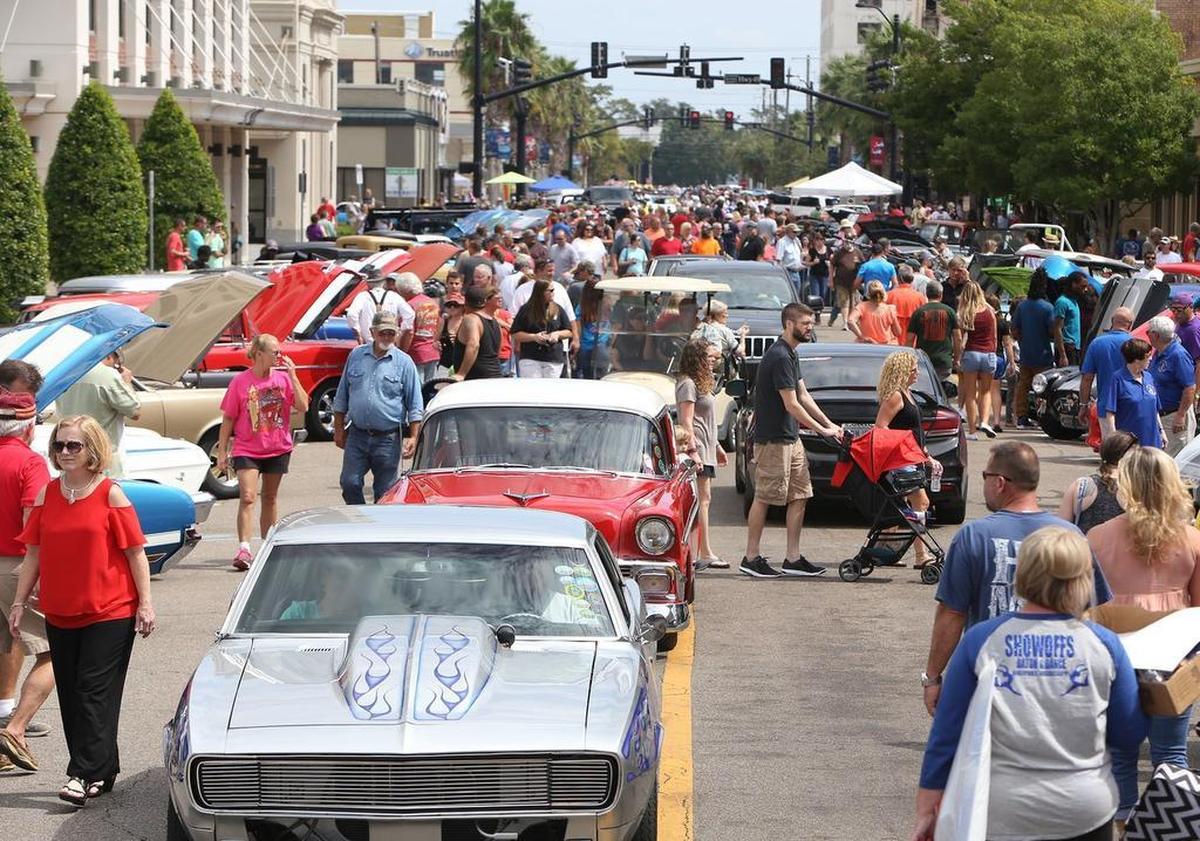 Visitors and classic cars fill downtown Gulfport during their View The Cruise on the first day of Cruisin' The Coast on Sunday, Oct. 2, 2016.