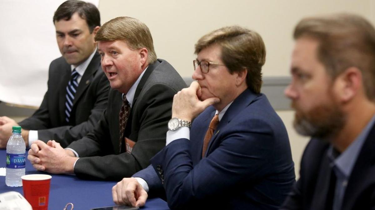 State Rep. Greg Haney, second from left, speaks on a panel with his fellow legislators during Leadership Gulf Coast’s Government Day on Wednesday, December 14, 2016, in Gulfport. Also present were Sen. Michael Watson, left, Rep. David Baria, center, and Rep. Scott DeLano.