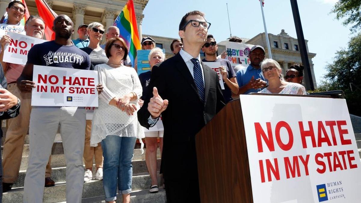 Rabbi Jeremy Simons, Director of Rabbinic Services for the Institute of Southern Jewish Life, speaks on the steps of the Mississippi Capitol in Jackson on Friday as he and others celebrated Thursday's ruling of a federal judge who blocked a Mississippi law on religious objections to same-sex marriage moments before it was set to take effect Friday. Simons was a plaintiff in one of the cases challenging the law. Simons said Reform Judaism has a history of accepting and including LGBT people.
