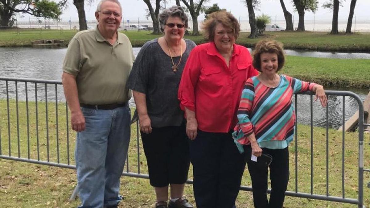 More than 60 years after they moved away, Lawrence Behan Jr., Deborah Zeitsuss, Nancy Clauer and Ann LaRosa return to Centennial Plaza in Gulfport on Monday, March 27, 2017.
