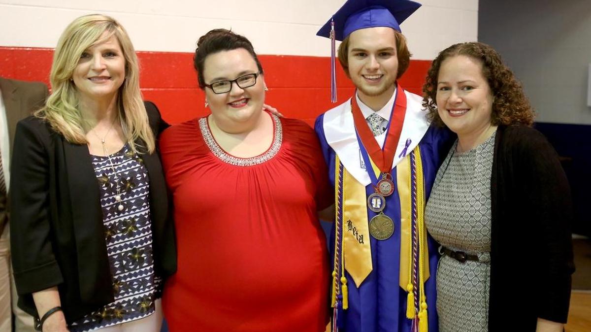 Trevor stands with the three teachers that impacted him the most during his high school career at Hancock High. From left, Kelley McKnight, Amanda Pidgeon, Trevor Ladner and Sarah Bailey.