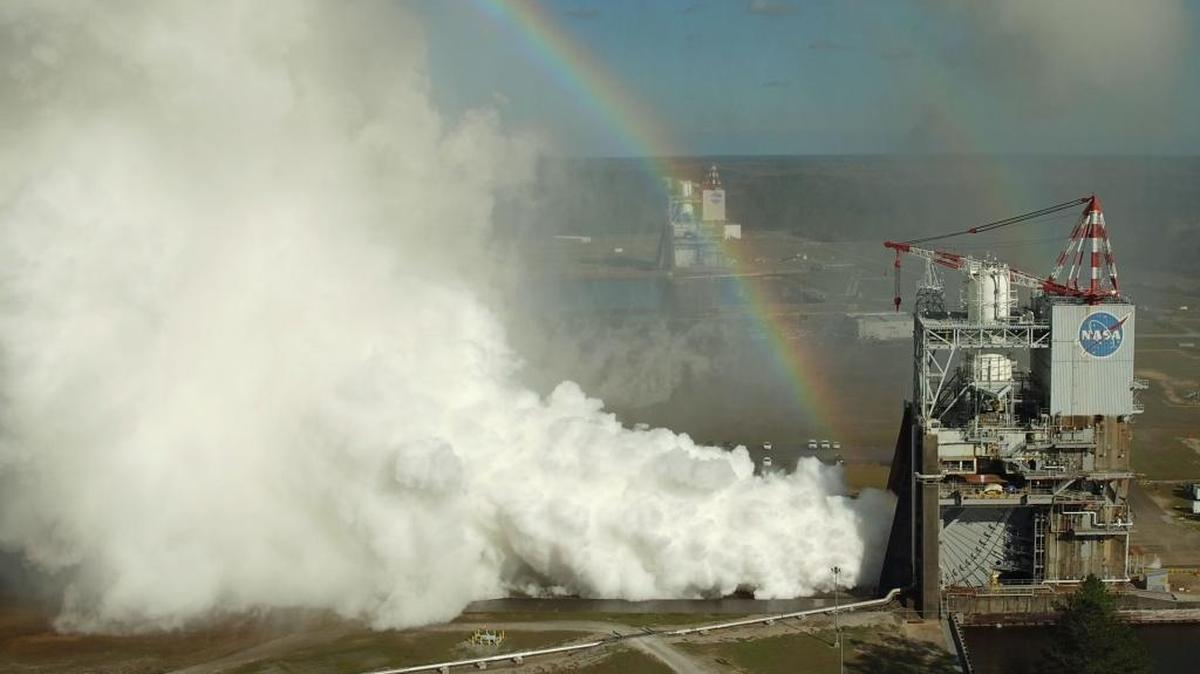 A drone captures an overhead view of an RS-25 rocket test at Stennis Space Center Wednesday, Feb. 22, 2017, along with a rainbow. The public is invited to get a free ticket and witness the test on Oct. 19.