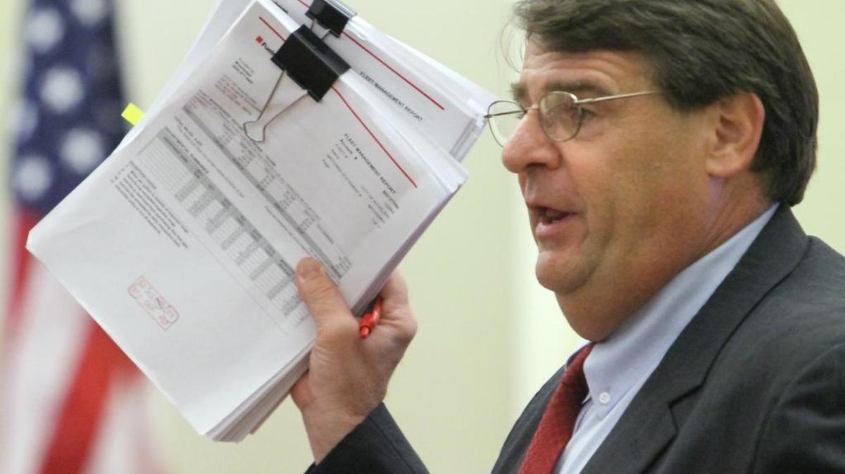 Donald Rafferty, attorney for Waveland Mayor Tommy Longo, holds up Fuelman reports used as evidence in Longo's trial for embezzlement during closing arguments in 2010 at Hancock County Circuit Court. Rafferty’s time as Bay St. Louis city attorney may come to an end soon.