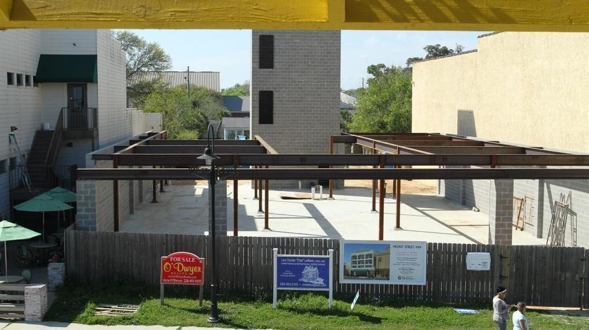 Front Street Inn, seen here from a second-floor window of The Blind Tiger restaurant, is under construction in Old Town Bay St. Louis. Business owners say a big attraction in Old Town is the number of restaurants, bars and shops in a small area.