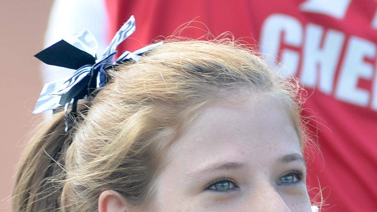 Whitley McQueen is a freshman cheerleader at Hancock High School.